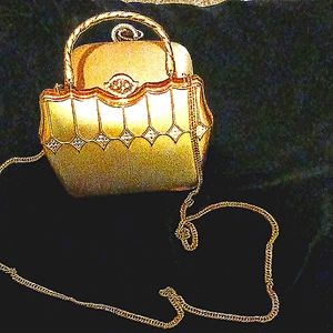 Beautiful gold purse with cubic carzoni crystal